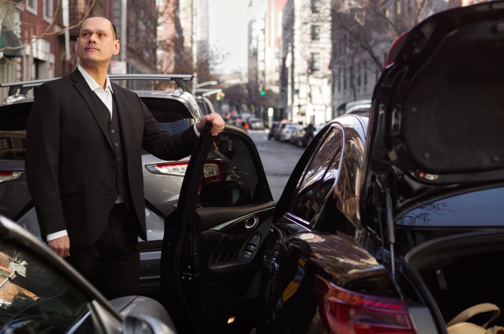 Boston limo tours vehicle in front of historic landmark