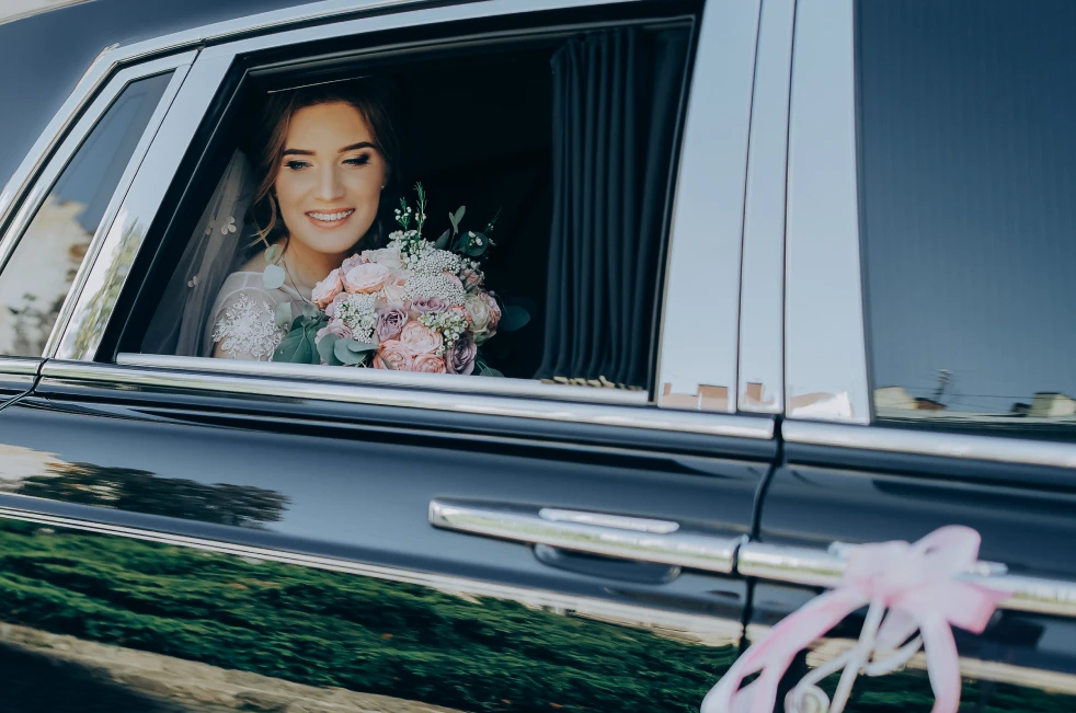 Classic wedding limousine parked at Boston wedding venue